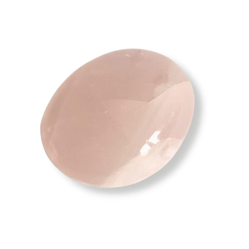high quality rounded blush pink polished Rose Quartz palm crystal held by hand